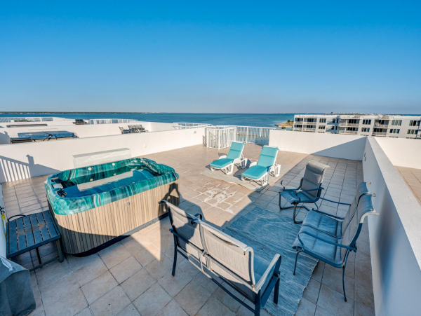 Sweeping views of Bay and Gulf from Private rooftop patio